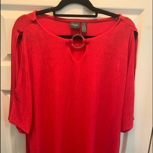 Adorable red cold shoulder shirt .